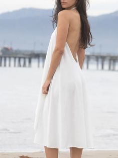 Zera | Simple White Dress – glorka Chic Backless Halter Dress For Brunch, Flowy Backless Dress For Brunch, Elegant Sleeveless Beach Dress For Brunch, Chic Flowy Backless Dress For Brunch, Elegant Backless Midi Dress For Vacation, Elegant Sleeveless Midi Dress For Beach Wedding, Chic White Backless Halter Dress, Vacation Elegant Backless Midi Dress, White Backless Dress With Back Opening For Summer