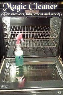 an oven with the door open and a bottle in it