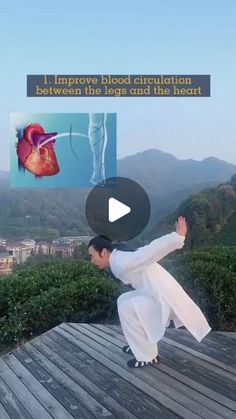 a man in white is doing yoga on a wooden platform