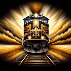 an image of a train going down the tracks with lights coming from its front end