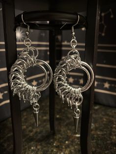 the earrings are made from silver wire