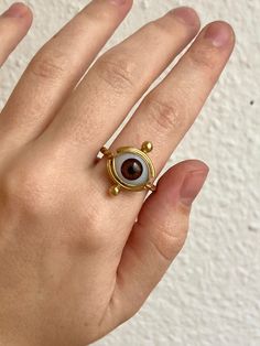 These handmade gold eye ring is made of brass, a light and comfortable material to wear. It's an ideal choice if you are looking for original rings for yourself or for a Birthday, Christmas or Valentine's Day gift to surprise someone else. * Features: - Material: brass - Color: golden - Weight: 3,5 grams (0.12 ounces). - Custom size Orders are delivered carefully packaged so that they arrive at your home in perfect conditions. You also have the option to have them gift wrapped and include a pers Gold Evil Eye Open Ring, Gold Open Ring With Evil Eye, Gold Open Ring With Evil Eye Detail, Cottagecore Fits, Boho Statement Ring, Protection Ring, Golden Eyes, Protection Amulet, Gold Eyes