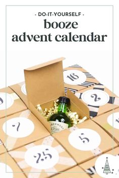 a bottle of booze sitting in a cardboard box with numbers around it and the text do - it - yourself booze advert calendar