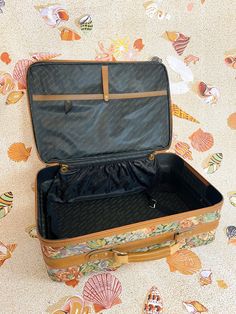 Flower print suitcase with a top handle and wheels. Standard TSA carry-on size with minimal wear / in great vintage condition. Multiple pockets inside and out for storage and a removable strap that clips at the sides. Free shipping within the US included. Measures 22"L x 14"W x 6"D Vintage Suitcases, Carry On Size, Vintage Things, Fame Dr, Suitcases, 6 D, Flower Print, Flower Prints, Inside Pocket