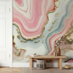 a living room with a marble wallpaper and wooden table in front of the door