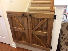 a wooden cabinet with two doors on it