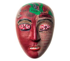 a red mask with words written on it