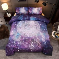 a bed covered in purple and white comforter next to a night sky with stars