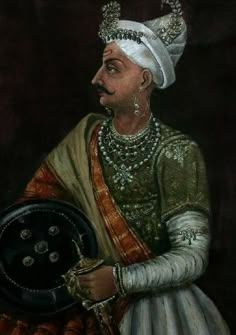 an old painting of a man wearing a turban and holding a black plate