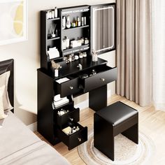 a black vanity with mirror and stool in a bedroom next to a white rug on the floor