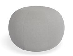 a large gray ball sitting on top of a white floor