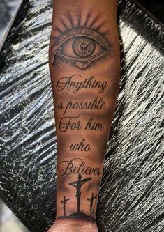 a person with a tattoo on their arm that says, anything is possible for him who believe