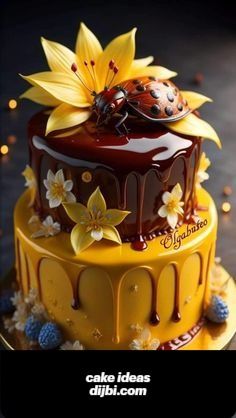 a cake decorated with flowers and a ladybug on top