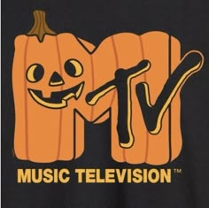 a black t - shirt with an orange pumpkin and the words music television on it