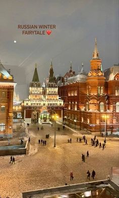 people are walking around in an old european town square at night with the words russian winter fairytale above them