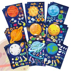 a bunch of stickers that are on top of each other in the shape of planets