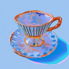 a cup and saucer sitting on top of a blue plate with an orange rim