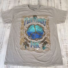 Brand New Without Tags Officially Licensed Graphic Band Tee From Urban Outfitters Fleetwood Mac Vintage Style 90s Tee Discoloration Is Intentional For Vintage Style Look Graphic Print Is The Same On Front And Back Size: Large Unisex 20” Pit To Pit 28” Length 100% Cotton *Shirt Is Brand New And Never Worn, However Seems To Have A Paint Stain On The Front. I Am Unsure If This Is Intentional Or A Flaw* Neon Carnival, Graphic Band Tees, 90s Tees, Champion Brand, Fleetwood Mac, Paint Stain, Cotton Logo, Urban Outfitters Tops, Tour T Shirts