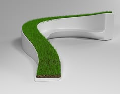 a curved bench with grass growing out of it's sides on a white background