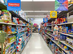 an aisle in a store filled with lots of toys