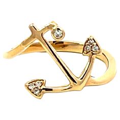 Item Specifications: Metal: 14K Yellow Gold ​​​Ring Size: 6.5 Total Weight: 2.7 Grams Diamond Count: 7 diamonds Diamond Carat Weight: ~0.05 Carat Diamond Color: H-I Diamond Clarity: SI1 Condition: Preowned, excellent ​ ​Stamped: "Nahoku" "14k" Anchor Ring, Anchor Rings, Diamond Carat, Yellow Gold Ring, Diamond Color, Diamond Clarity, Yellow Gold Rings, Cocktail Rings, Gold Ring