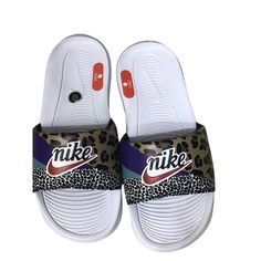 - Brand New - Women's Size 6 Nike Victori One Slides Sandals Cn9676-104 In Women's Size 6 Are A New, Unworn Pair Of Shoes Without A Box. These Sandals Feature A White And Black Animal Print Pattern With Accents Of Electro Purple And Habanero Red. The Slide Closure Makes Them Easy To Put On And Take Off. The Flat Heel Style And Rubber Upper Material Make Them Lightweight And Comfortable To Wear. These Nike Benassi Sandals Are Perfect For Any Casual Occasion. Nike Sandals With Removable Insole, Nike Sandals With Removable Insole And Round Toe, Trendy White Sport Sandals With Round Toe, Trendy White Round Toe Sport Sandals, Nike Sandals With Cushioned Footbed And Round Toe, Synthetic Slip-on Sneakers For Beach, Nike Slide Sandals With Rubber Sole, Nike Slides With Cushioned Footbed And Round Toe, Nike Open Toe Slides For Streetwear