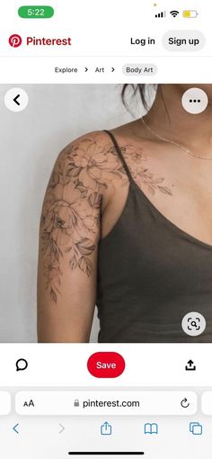 a woman with tattoos on her arm and chest is looking at an instagramr