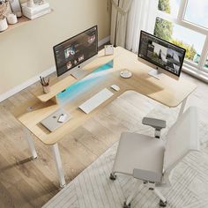 a computer desk with two monitors on it