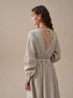 Bohemian A-line Dress With Buttons, Bohemian Tunic Dress With Buttons, Elegant Tunic Dress With Buttons, Beige Dresses For Spring Gatherings, Elegant Tunic Linen Dress For Daywear, Elegant Linen Tunic Dress For Daywear, Elegant Long Sleeve Dress For Gatherings, Beige Spring Dresses For Gatherings, Chic Spring Tunic Linen Dress