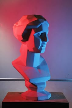 a sculpture is shown with red and blue colors