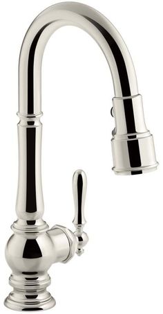 a kitchen faucet with chrome finish and black handles