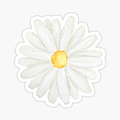 a white flower with yellow center sticker