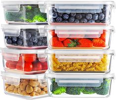 a stack of plastic containers filled with different types of fruits and veggies in them