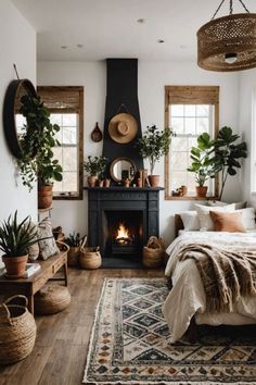 a bedroom with a fireplace and lots of potted plants