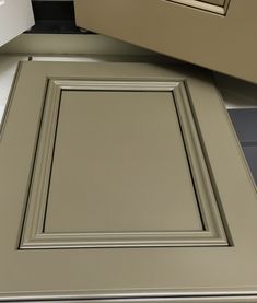 an image of a kitchen cabinet door and drawer