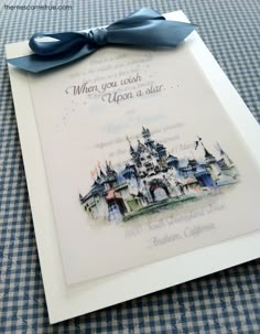 a card with a blue bow on it that says when you wish upon a star