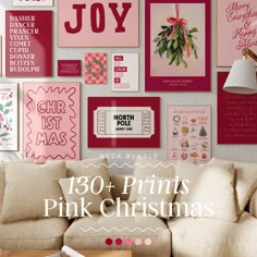 a living room filled with lots of pink christmas decorations and pictures on the wall above it