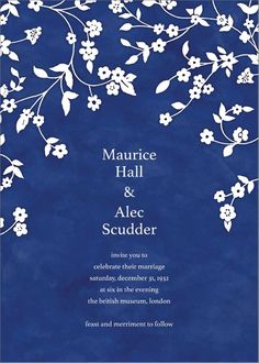 a blue wedding card with white flowers and leaves on the front, which reads marriage hall and