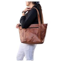 Brown Leather-backed Shoulder Bag For Weekend Trips, Brown Leather-backed Tote Travel Bag, Elegant Travel Shoulder Bag With Vegetable-tanned Leather, Travel Shoulder Bag In Cognac Vegetable-tanned Leather, Tote Bag For Work, Vintage Brown Hand-tooled Travel Shoulder Bag, Brown Leather Tote Bag, Western Vintage, Brown Leather Totes