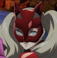 an anime character wearing a cat mask with blue eyes