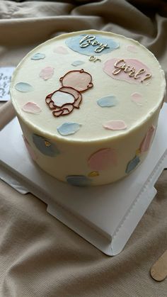 there is a cake on the table for someone's baby shower party or celebration