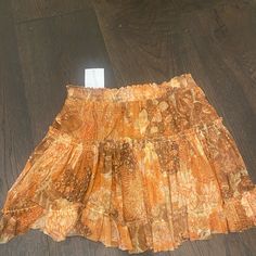 Brand New With Tags Ruffle Mini Skirt Orange Relaxed Mini Skirt With Lining, Orange Relaxed Fit Lined Mini Skirt, Orange Mini Skirt For Summer Beach, Orange Mini Skirt For Beach In Summer, Orange Mini Skirt Casual Style, Summer Beach Orange Mini Skirt, Bohemian Orange Skirt For Spring, Orange Relaxed Mini Skirt, Orange Relaxed Fit Mini Skirt