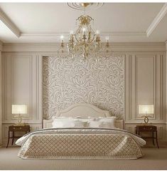 an elegant bedroom with chandelier and white walls