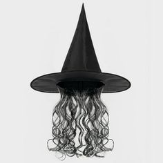 a black witches hat with long curly hair