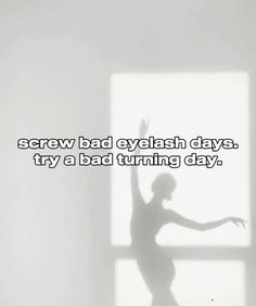 a woman standing in front of a window with the words screw bad eyelash days try a bad turning day