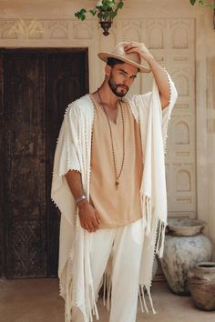 White Raw Cotton Minimalist Poncho for Men | AYA Sacred Wear Men’s Bali Outfits, Bohemian Style Clothing Men, Mens Boho Chic Style, Tuluminati Outfit Hombre, Morocco Men Fashion, Cochella Outfits 2023 Men, Tulum Outfits Men, Bohemian Men Outfit, Hippie Outfits Hombre