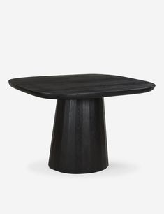 a black table with a wooden top