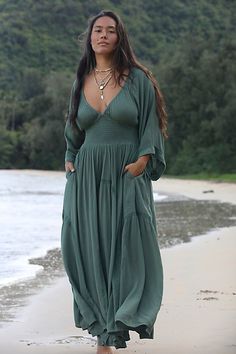 Romantic and ethereal, this sweet maxi from our free-est collection is a true versatile staple. **Fit:** Billowy throughout with cinched waist **Features:** V-neckline, smocked paneling at bodice, exaggerated sleeves, embroidered lace piecing at the skirt **Why We ❤ It:** Timeless with a sleek heel or laid back with simple flats, this style has endless ways to wear. | Dixie Maxi by free-est at Free People in Dried Pine, Size: XS