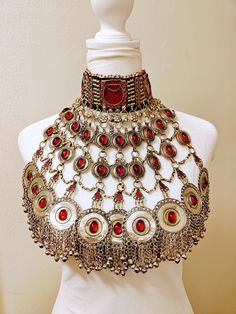 Handmade Afghan Red Jewelry Necklace Set, Massive Huge Afghan Necklace Choker, Afghan Jewelry Afghan Red Jewelry Set, ALERT! Heavy Item The piece is an Afghan Vintage Hand Made Necklace Choker. This item is an Afghan tribal Kuchi handmade unique choker. These items are never out of fashion, and you can wear them on a special occasion or daily basis. This item and materials are pretty old, but artisans rework them to make them look new for you. This beautiful choker necklace is also for beautiful Afghan Jewelry Set, Red Jewelry Necklace, Afghan Necklace, Red Jewelry Set, Unique Choker, Afghan Wedding, Beautiful Chokers, Afghan Jewelry, Red Necklace