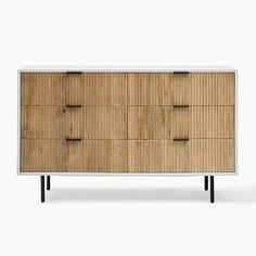 the sideboard is made out of wood and has four drawers with black handles on each drawer